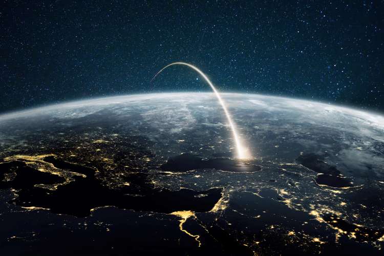 an artist's visualization of a rocket plume arcing over the earth into the stars beyond.