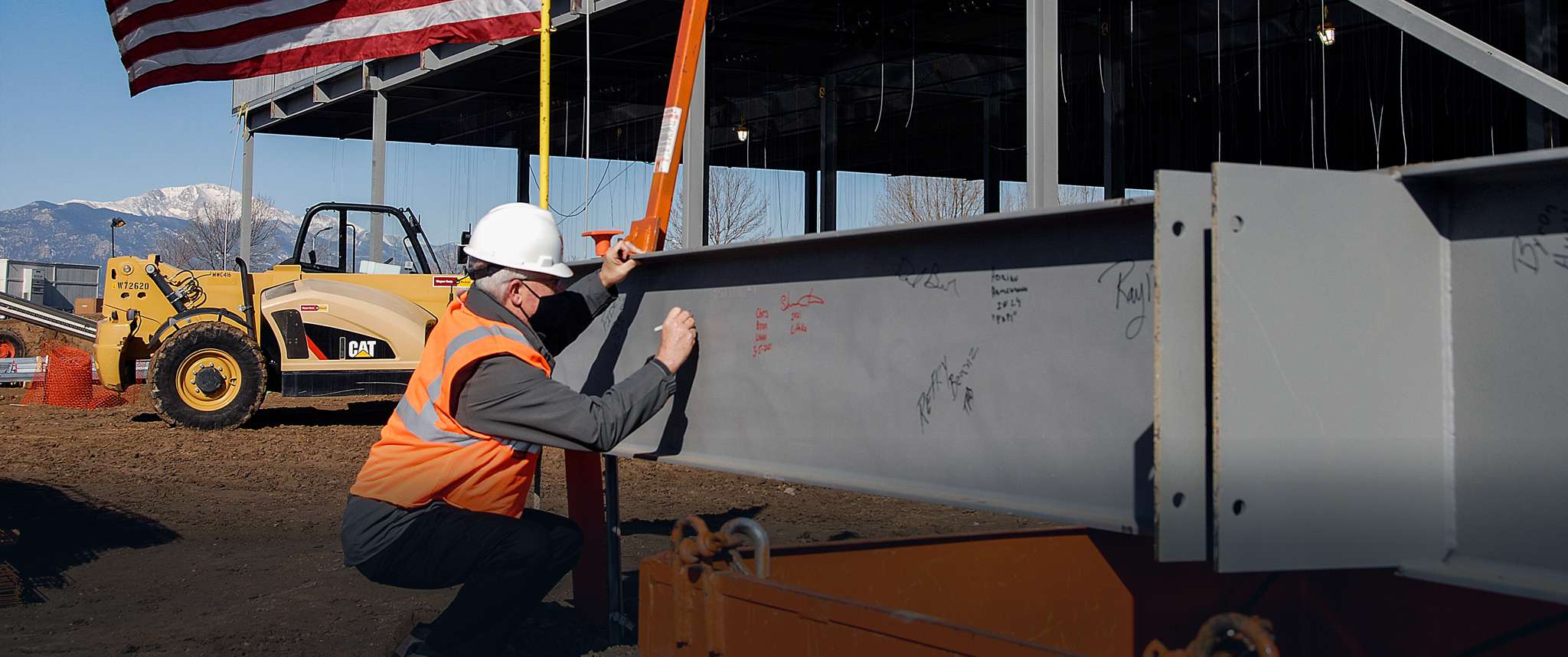 The construction team celebrate a significant milestone, placing the last beam on Aerospace’s second facility in Colorado Springs, Colorado, which is on track for completion in 2022.