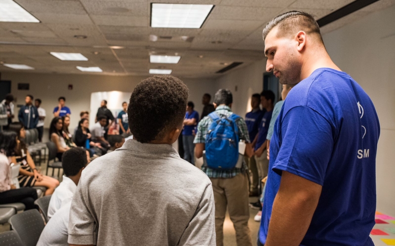 Aerospace Justin Mino chaperones a STEM tour in El Segundo