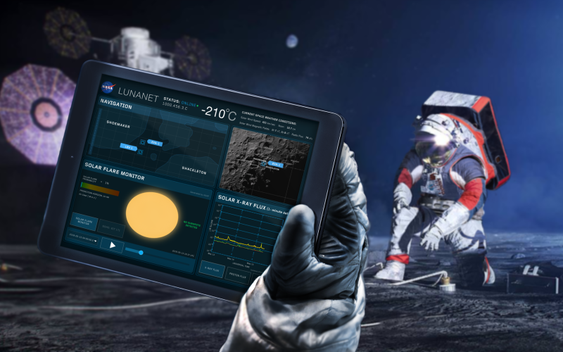 Astronaut using tablet on the Moon 